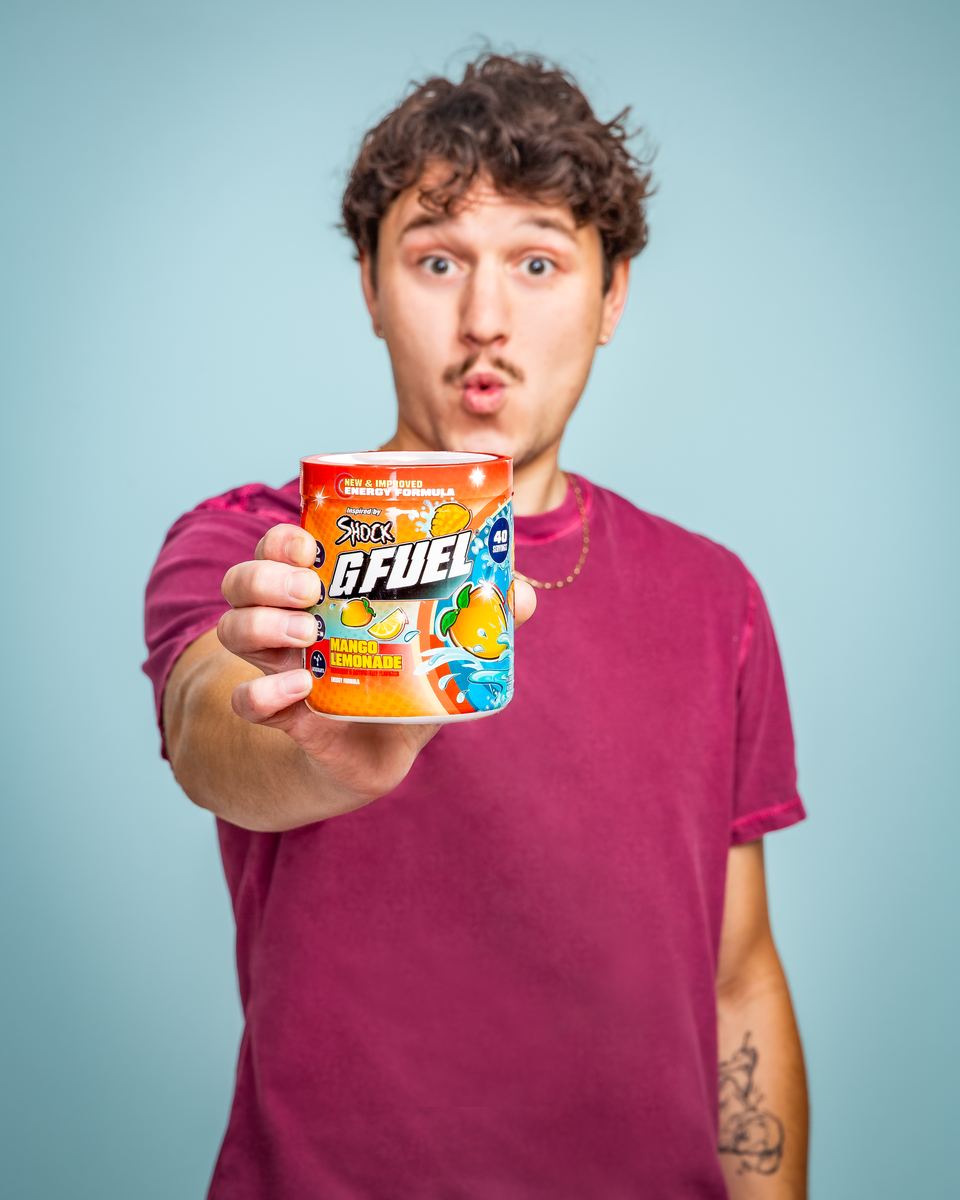 Shock holding the Mango Lemonade tub
