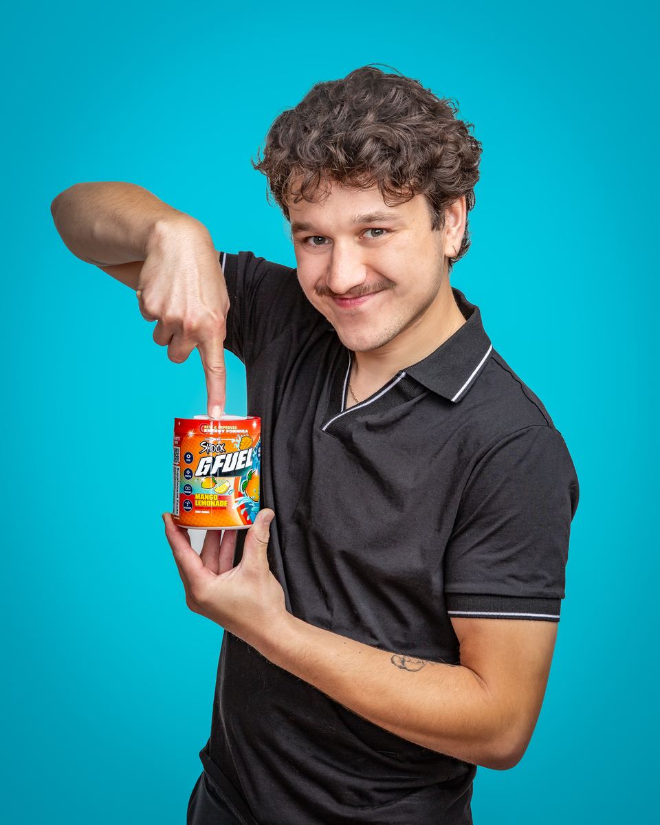 Shock pointing at the Mango Lemonade tub
